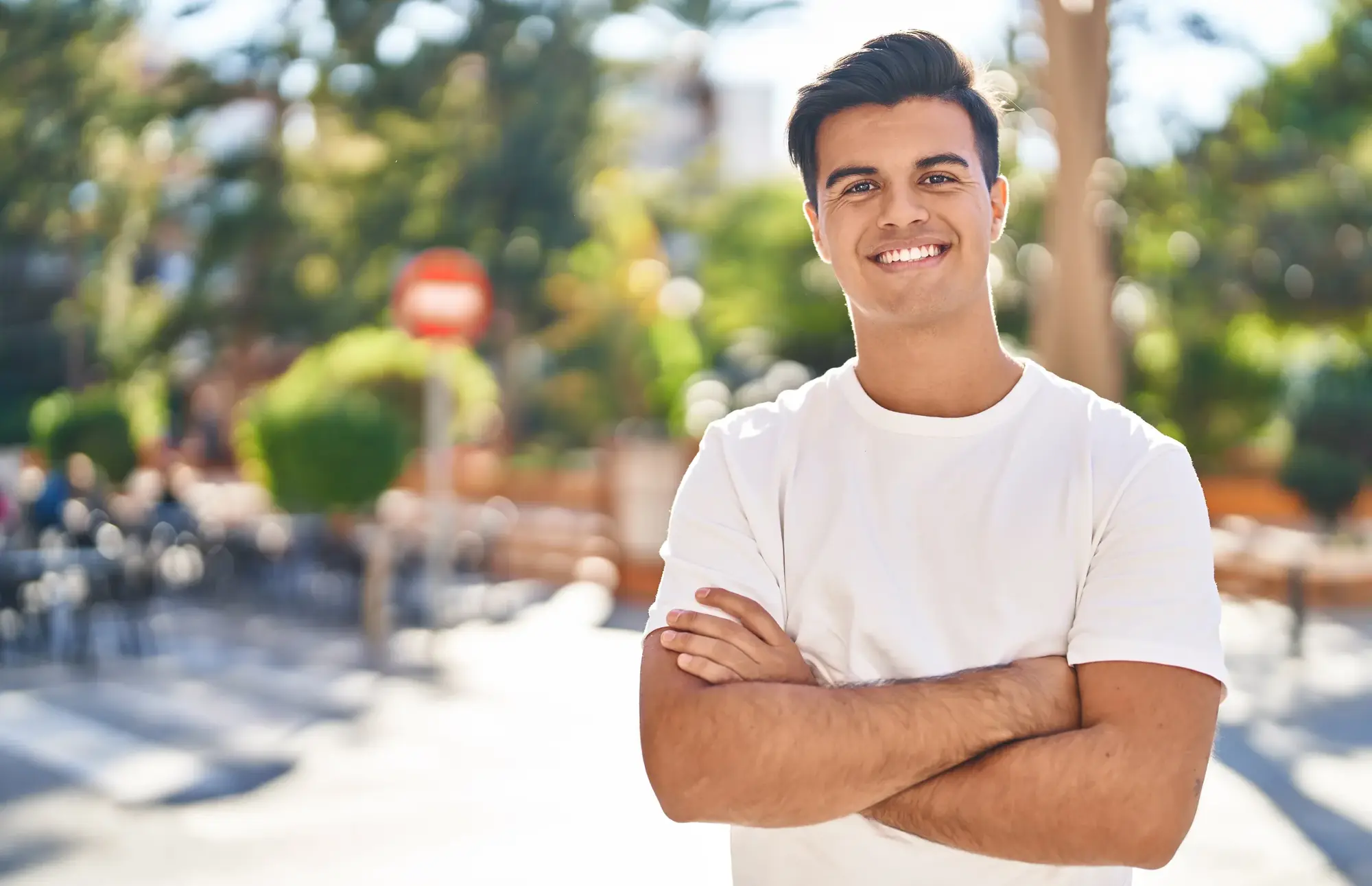 Young man smiling outdoors