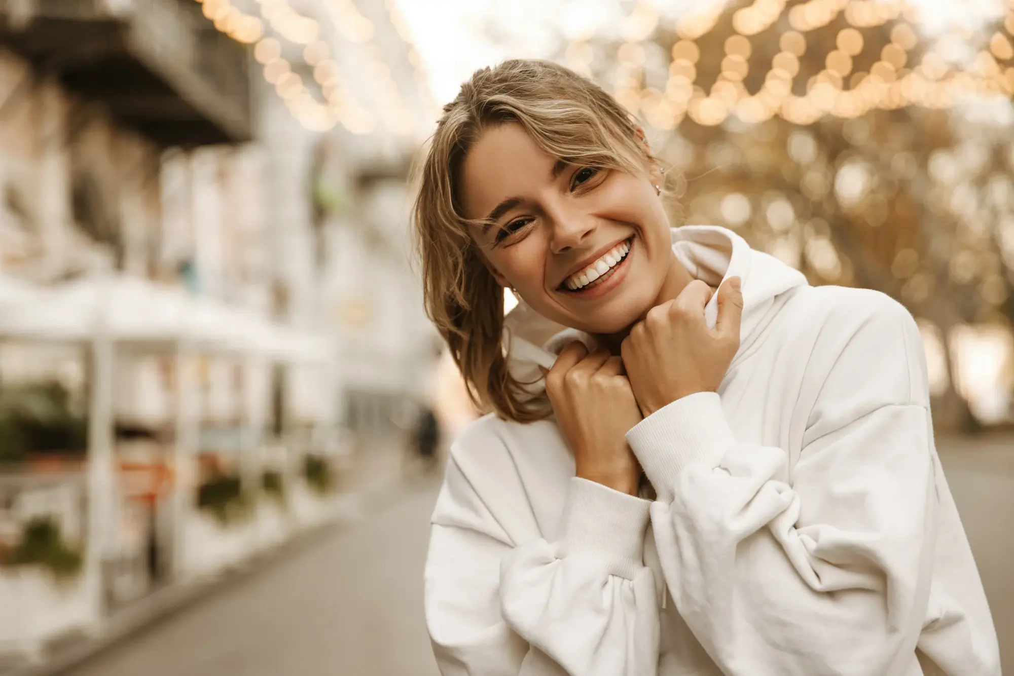 Woman smiling outdoors