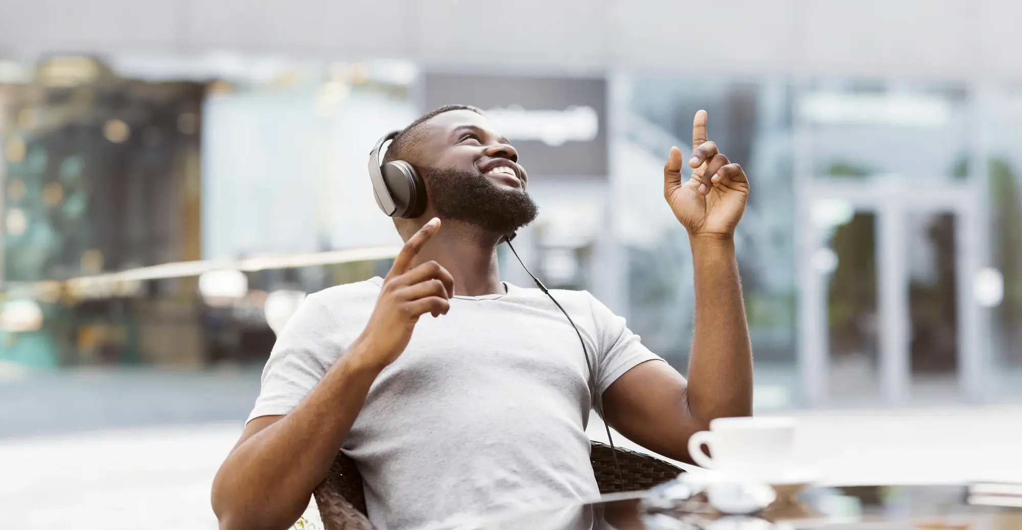 Man smiling while listening to music