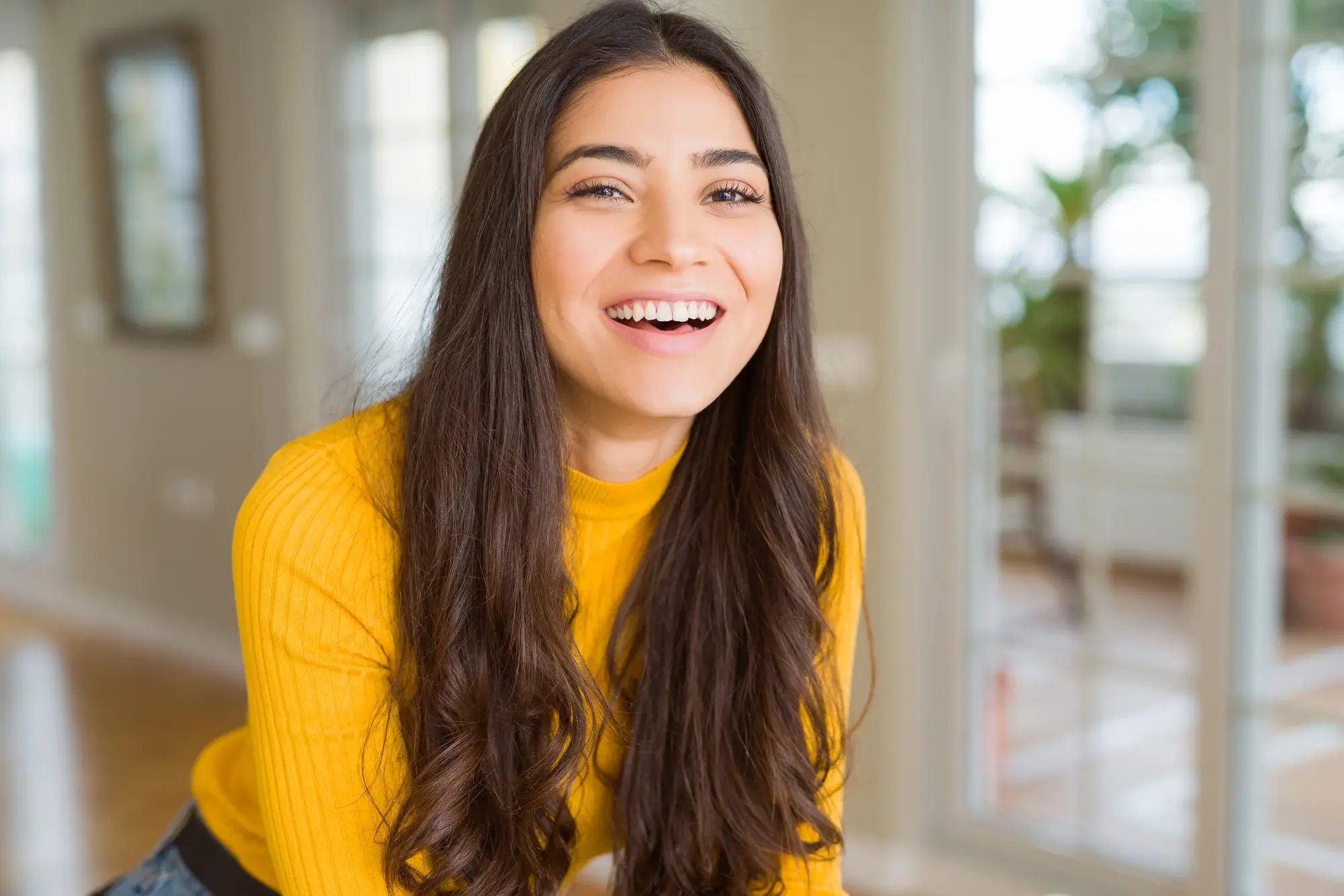 Patient smiling after teeth whitening